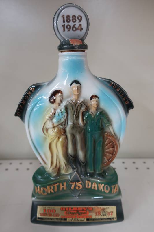 lot 334 image: Gilbeys North Dakota Diamond Jubilee Decanter - 1964