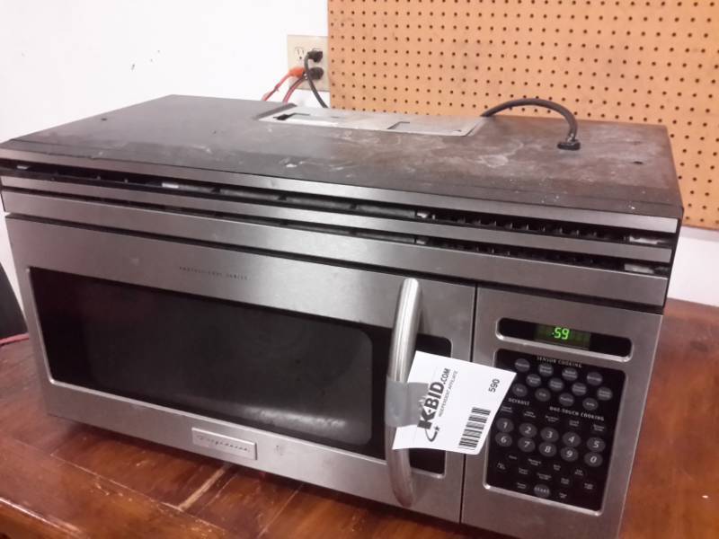 lot 590 image: Frigidiare Household Microwave Oven