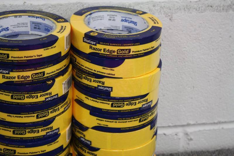 lot 26 image: 36 Rolls of Razors Edge Gold 1 Painters Tape - New
