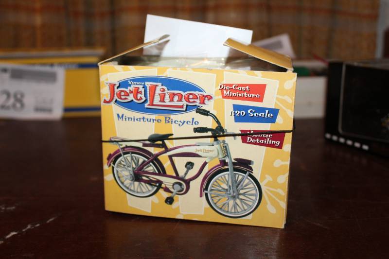 lot 212 image: Vintage Die Cast Metal Jet Liner Bicycle