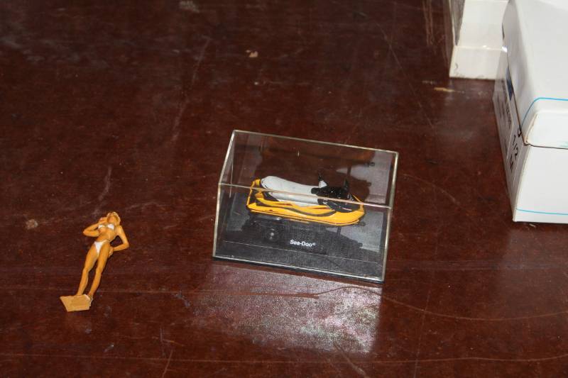 lot 255 image: Skidoo Sea-Doo Scale Model Personal Water Craft with Case, Lady Figurine