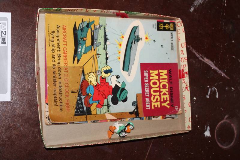 lot 248 image: Vintage Comics - Gold Walt Disney Mickey Mouse Super Secret Agent August, Gold Land of the Giants June, Donald Duck Figurine