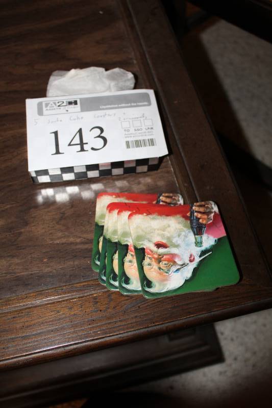 lot 143 image: Home Dcor - 5) Santa Coke Coasters, 2) Ornaments - Snow Globe, Snowman