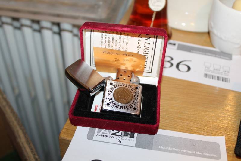 lot 301 image: 1906 Native American Coin Zippo Lighter