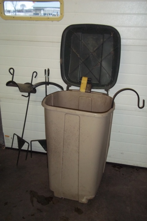lot 64 image: Garden Hose holders, Garbage can, Planters and basket holder