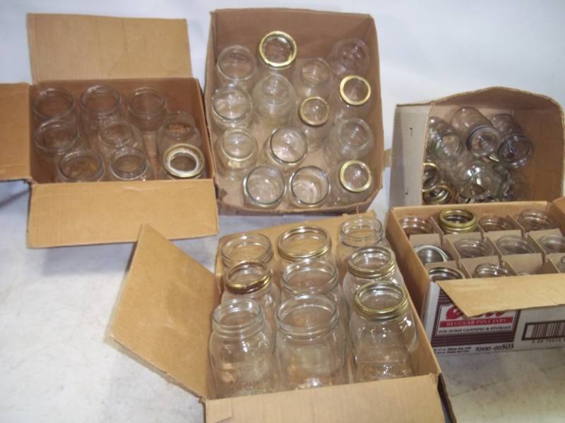 lot 73 image: 50 canning jars both pints and quarts includes some rings