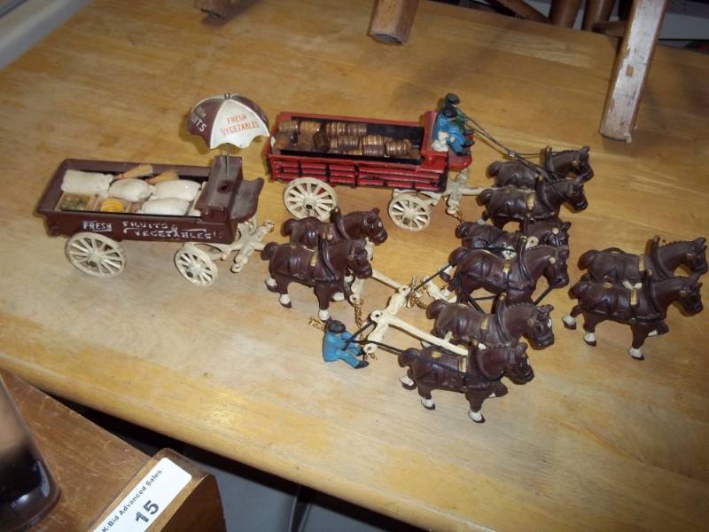 lot 82 image: Cast Iron Wagons and horses