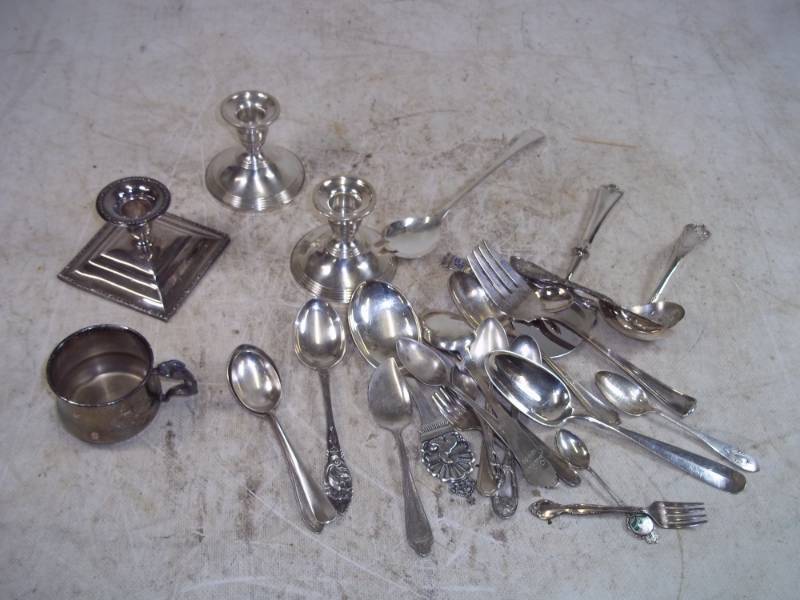 lot 116 image: Silverware, Candle holders and cup