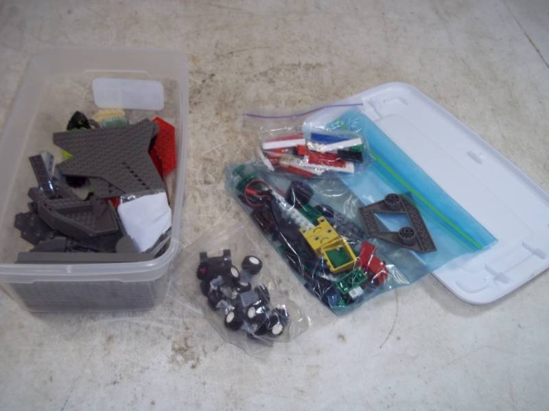 lot 157 image: Legos with storage tub