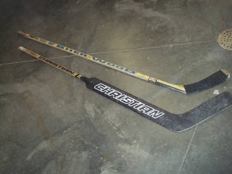 lot 166 image: Pair of Hockey Sticks