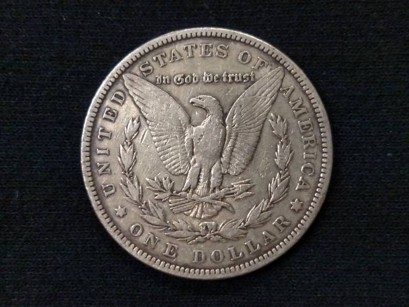 lot 6 image: 1880 Morgan Silver Dollar...