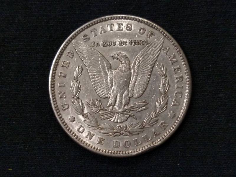 lot 11 image: 1885 Morgan Silver Dollar...
