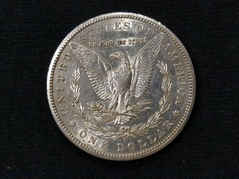 lot 13 image: 1887 S Morgan Silver Dollar...