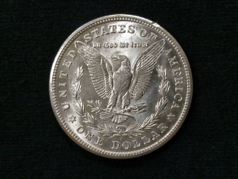 lot 23 image: 1921 S Morgan Silver Dollar...