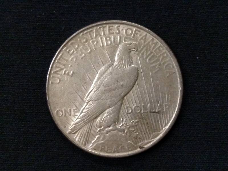 lot 26 image: 1922 D Peace Silver Dollar...