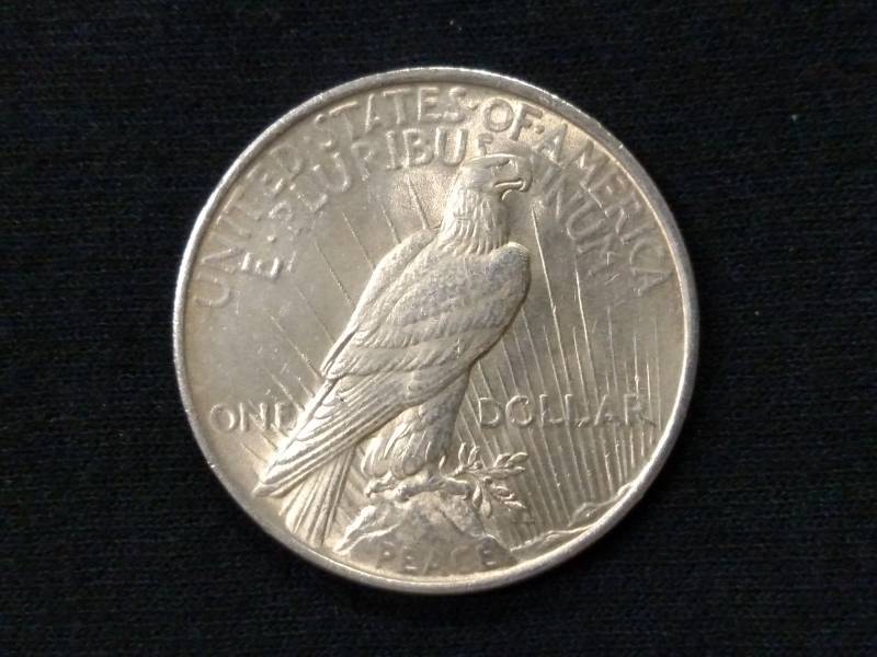 lot 28 image: 1923 Peace Silver Dollar...