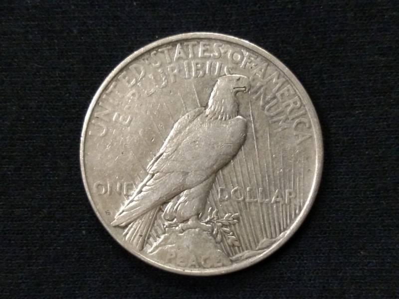 lot 34 image: 1927 D Peace Silver Dollar...