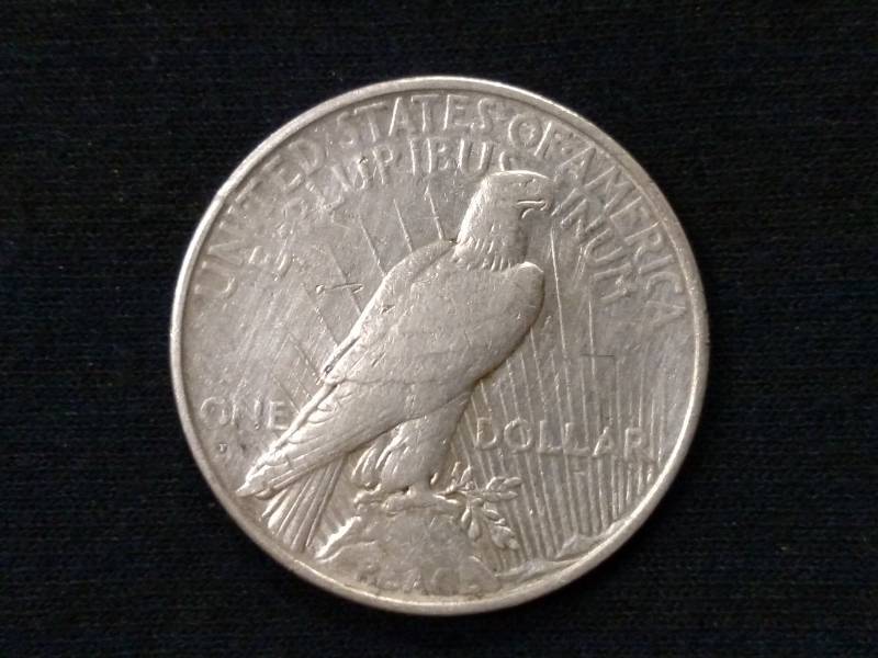 lot 35 image: 1934 D Peace Silver Dollar...