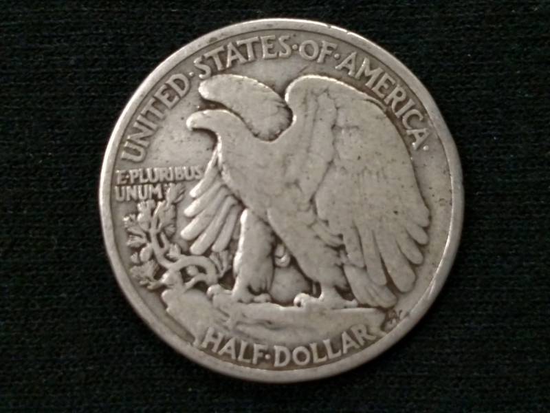 lot 36 image: 1934 Walking Liberty Silver Half Do...
