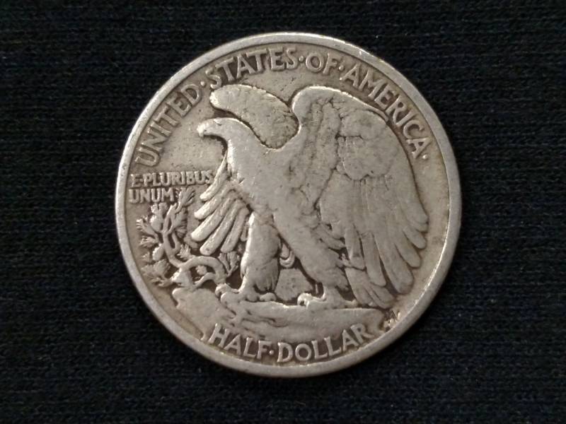 lot 42 image: 1942 Walking Liberty Silver Half Do...