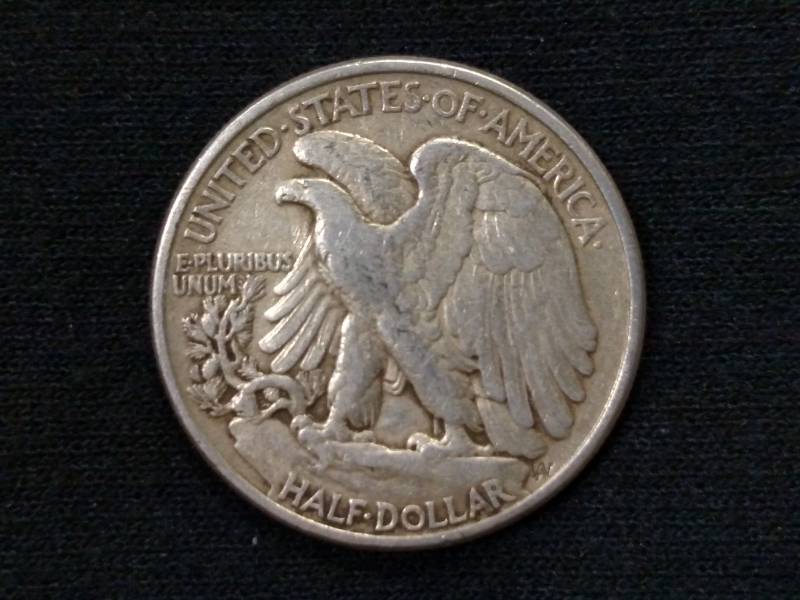 lot 47 image: 1945 Walking Liberty Silver Half Do...