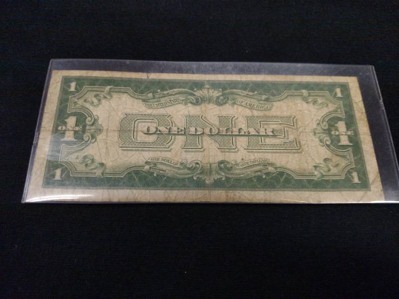 lot 69 image: 1928 A Funny Back Silver Certificat...