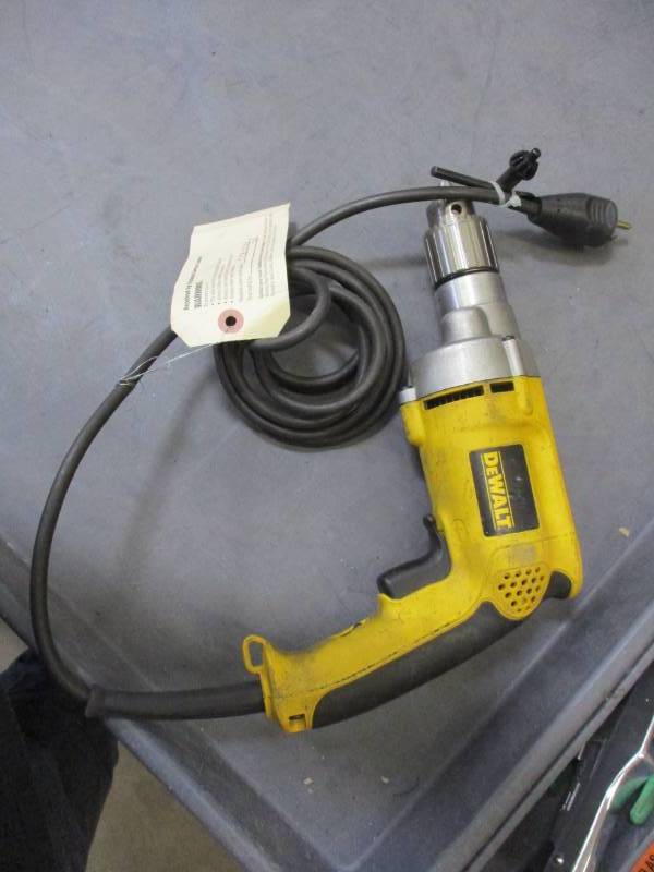 lot 74 image: 7.8 Amp 12 in. Variable Speed Reversing Drill