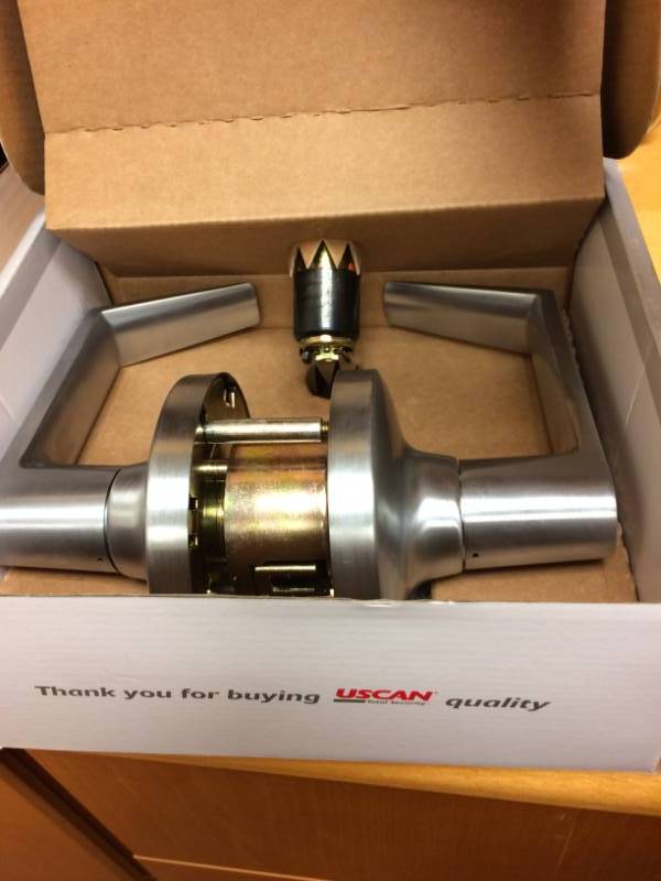 lot 8 image: New In Box Uscan Sercurity Brushed Stainless Steel Heavy Duty Door Knob Locking System - Keys are missing