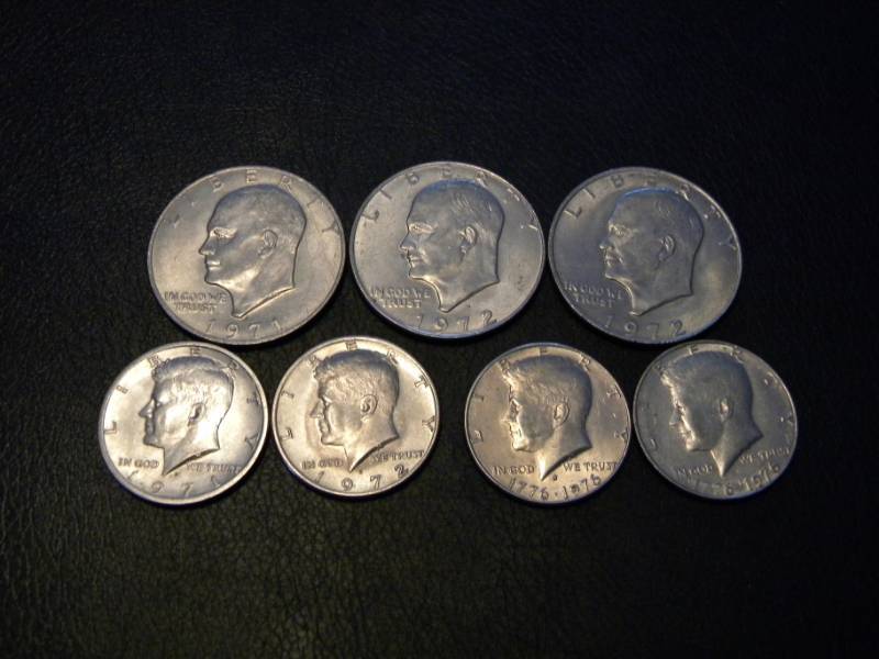 3 Eisenhower Dollars & 4 Kennedy Half Dollars