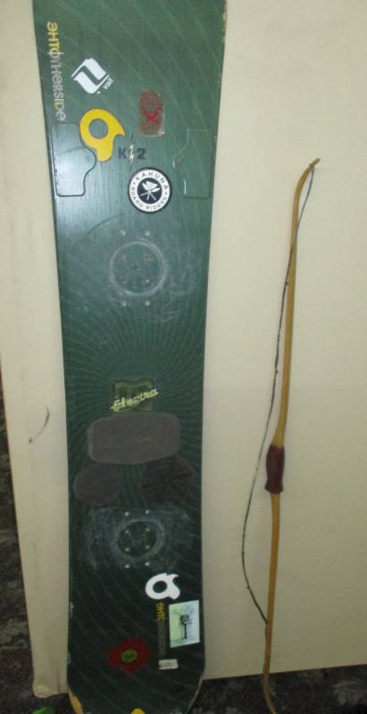 lot 35 image: Board without binding well used, jump soals and bow
