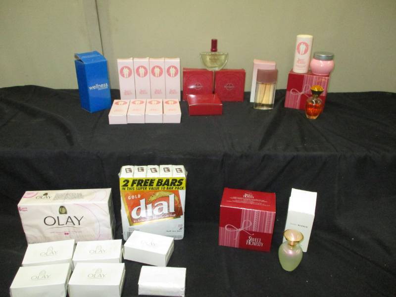 lot 74 image: Unused or unopened Avon Colognes and Perfumes and bar soap