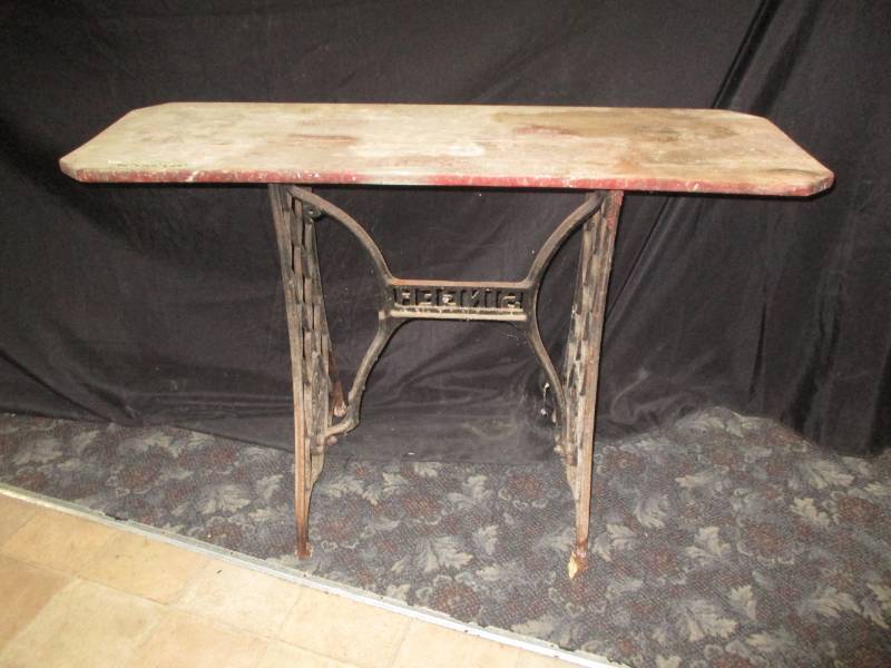 lot 95 image: Old sewing machine cast iron base