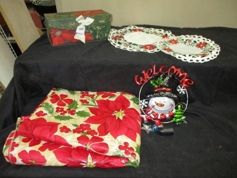 lot 109 image: Poinsettia items, TableCloth, Candle Votive Lamo and Snowman Chime