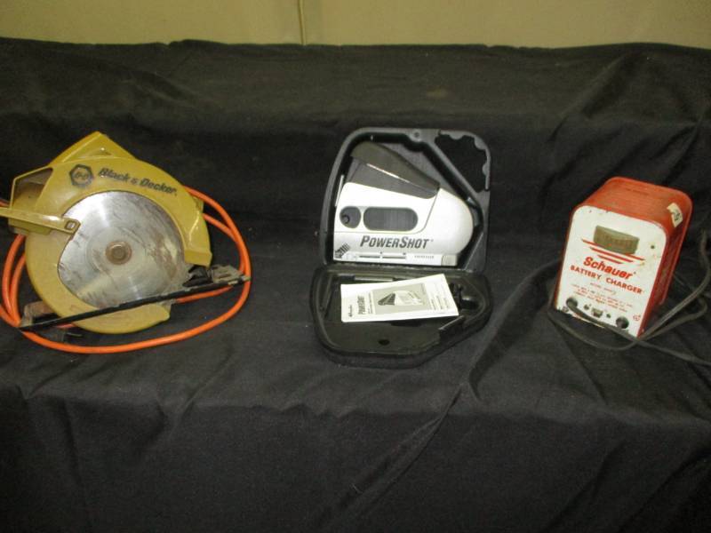 lot 182 image: Nice Power Shot Stapler Black and a Decker Saw and Battery Charger