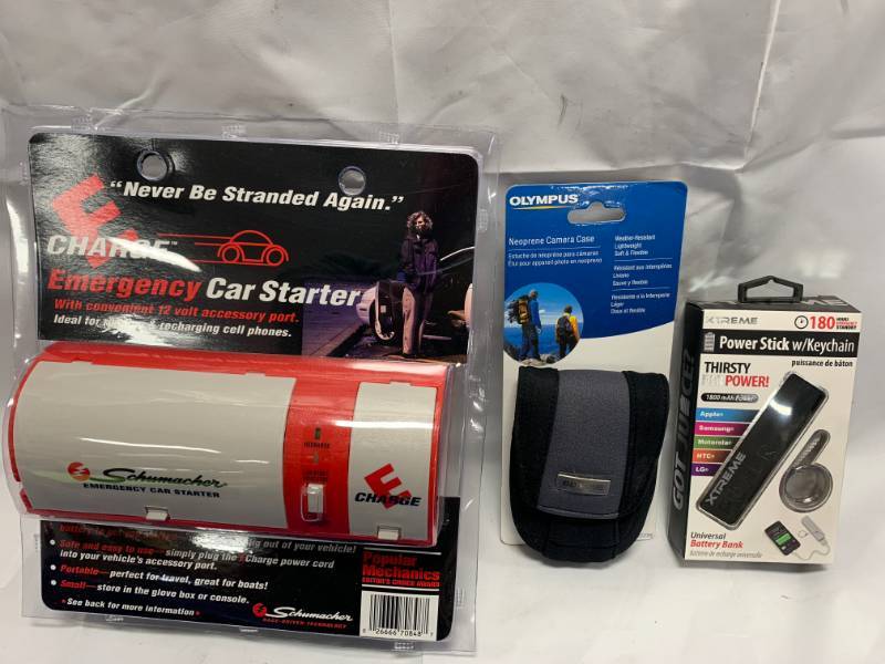 lot 19 image: Schumacher Emergency Car Starter, Camera Case, Keychain Phone Bank Charger
