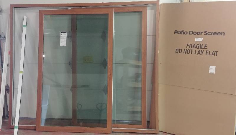 lot 64 image: as-New 8 3-Pane WoodGrain int Vinyl Patio Slider retail $3,200