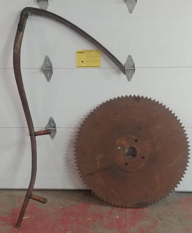 lot 96 image: Antique Saw Mill Blades & Sickel