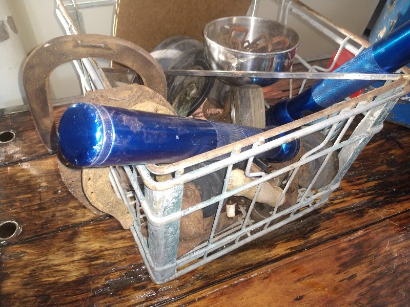 lot 15 image: Vintage Milk Crate, Horseshoes, Blue Heavy Duty Flashlight, Clipboards, Vintage Thermos, Vintage Blue Cooler