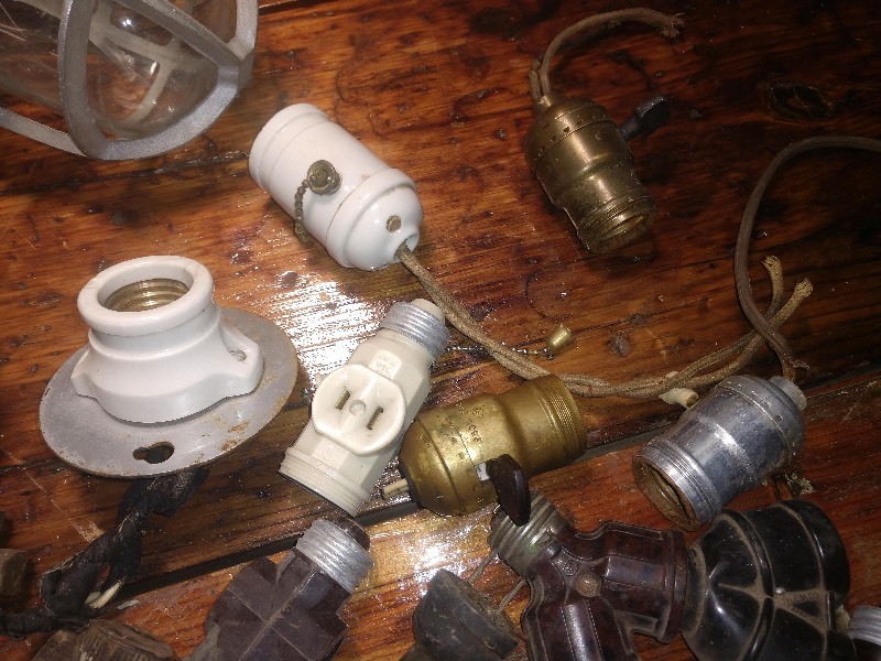 lot 22 image: Antique Explosion Proof Light Fixtures (2) and Lighting Parts
