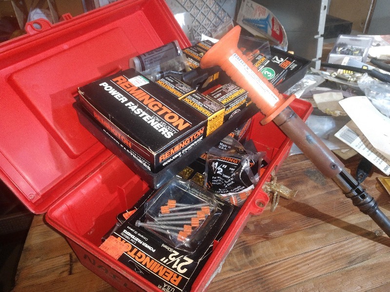 lot 26 image: Red Toolbox, Remington Hardware, Remington Powder Actuated Tool Model 476, Hook Key Box, Nails, Light Fixtures, and other Hardware