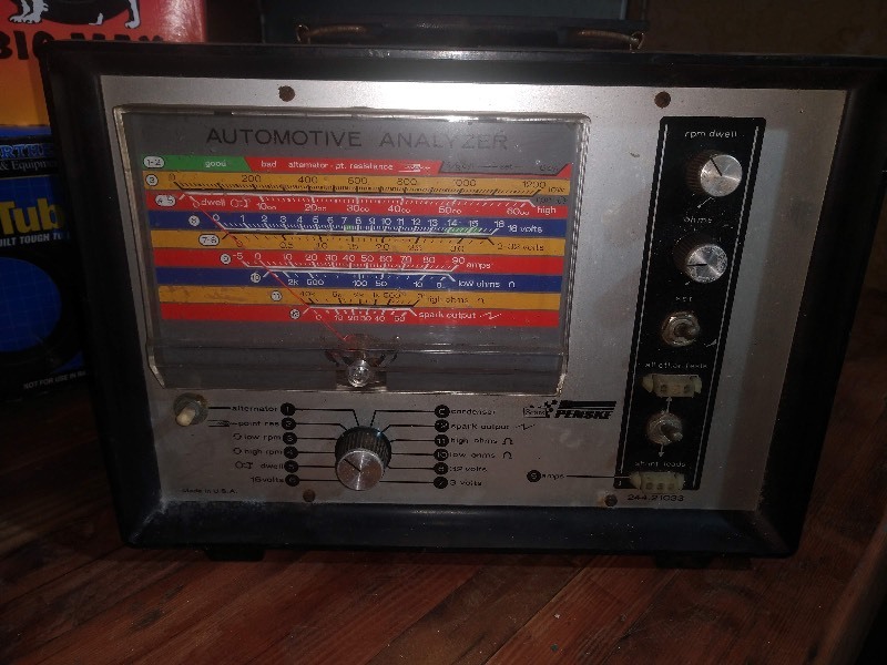 lot 30 image: Vintage Sears Roebuck and Co Automotive Analyzer, 24 PC Socket Set, Remote Control Starter Switch, Craftsman Timing Light, Brake Pads, Jumper Cables