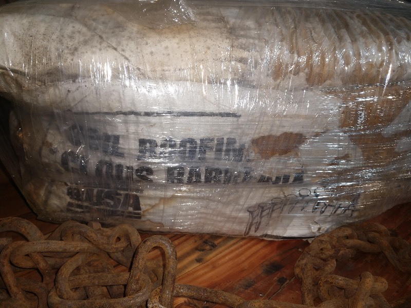 lot 32 image: Vintage Tire Chains and Roofing Coil Nails