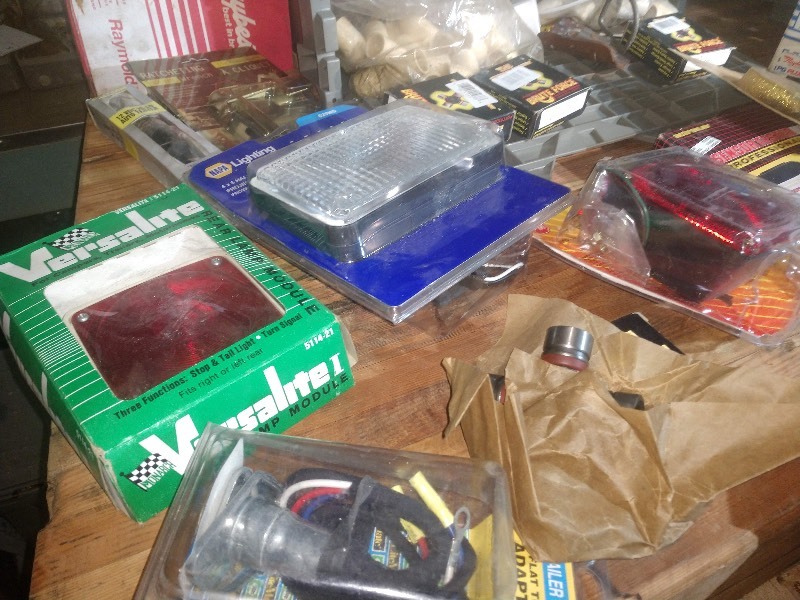 lot 36 image: Harley Davidson Super Premium Oil Filter, Action CP9087 Engine Ignition Module and Sensor Tester, Portable Magnetic Heater, Brake Pads, Trailer Wiring Kit, Rear Lamp Modules