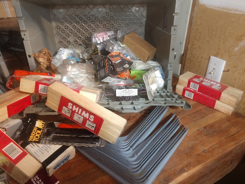 lot 37 image: Nelson Wood Shims, Gray Shelf Brackets, Outlet Boxes, Outlets, Screws, Remington Power Fasteners, Window Film Tool Kit