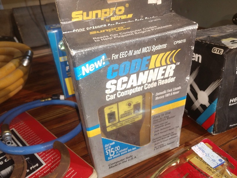lot 45 image: Sun Pro Code Scanner, Halogen Lights, Mini Fog Lights, Car Tester, Chalk Line Reel, CSST Tubing, Repair Manuel 93-02, Spark Plug Catalog, Hook Spanner Wrenches, Universal Joint, Interior Door Handle, GM Aluminum Fan Spacer