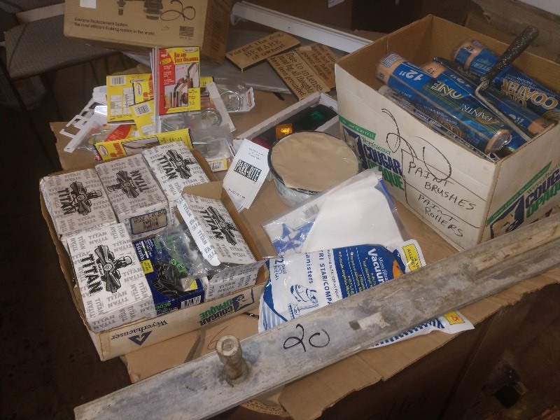 lot 72 image: Flushmate Pressure-Assist, Parking Assisting Light, Signs, Paint Brushes, Paint Rollers, Kwikset Titans, Voyager 9030 Electronic Brake Control, Bat and Stick Organizers