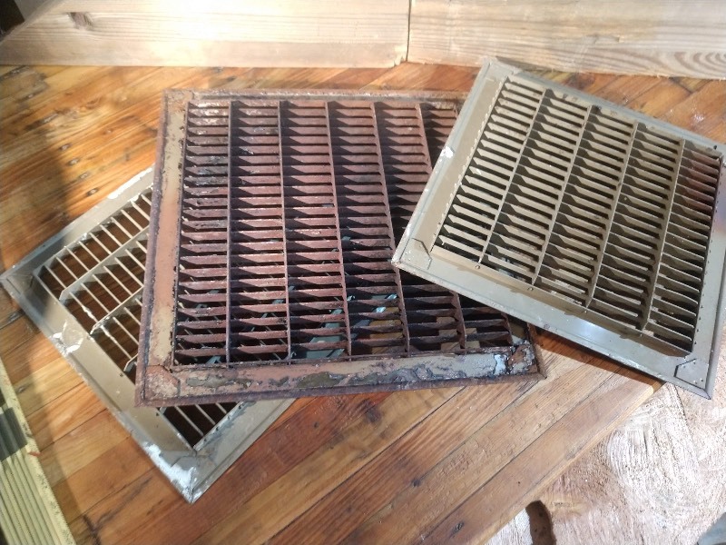 lot 103 image: Antique House Heat Grates (3)