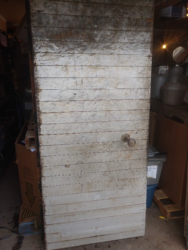 lot 112 image: Antique Heavy Duty Wood Walk-In Freezer Door .