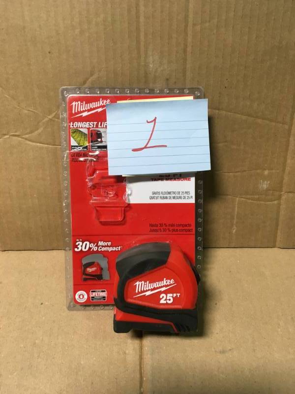 lot 1 image: MILWAUKEE 25 ft. Compact Tape Measure not used
