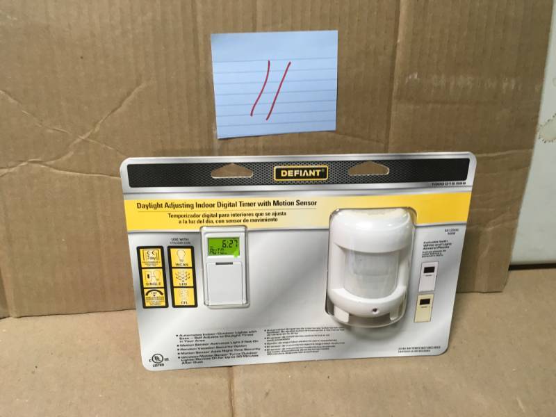lot 11 image: Defiant 8 Amp 7-Day Indoor In-Wall SunSmart Digital Timer Switch with Motion Sensor, White not used